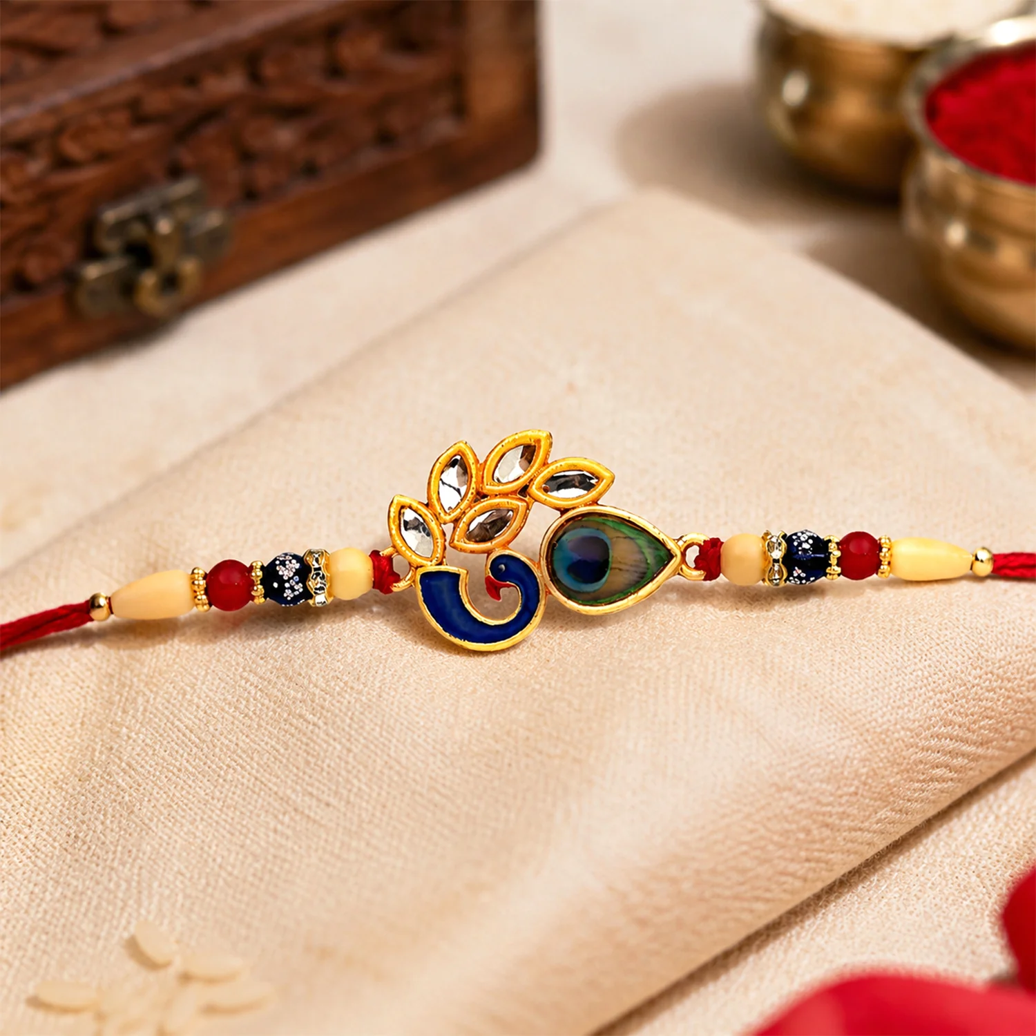 Mor Pankh Rakhi – Artistic Enamel Design with Traditional Thread - Image 3