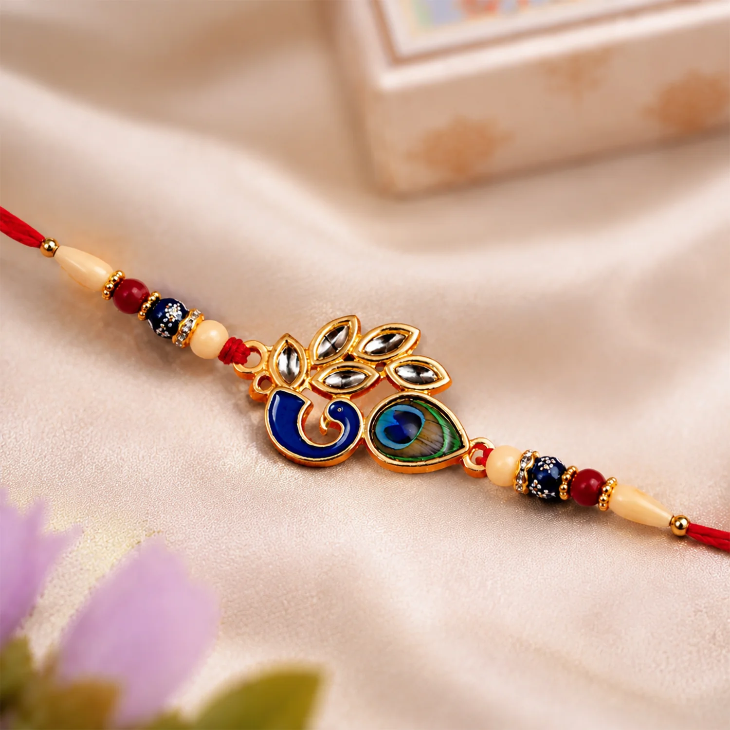 Mor Pankh Rakhi – Artistic Enamel Design with Traditional Thread - Image 4