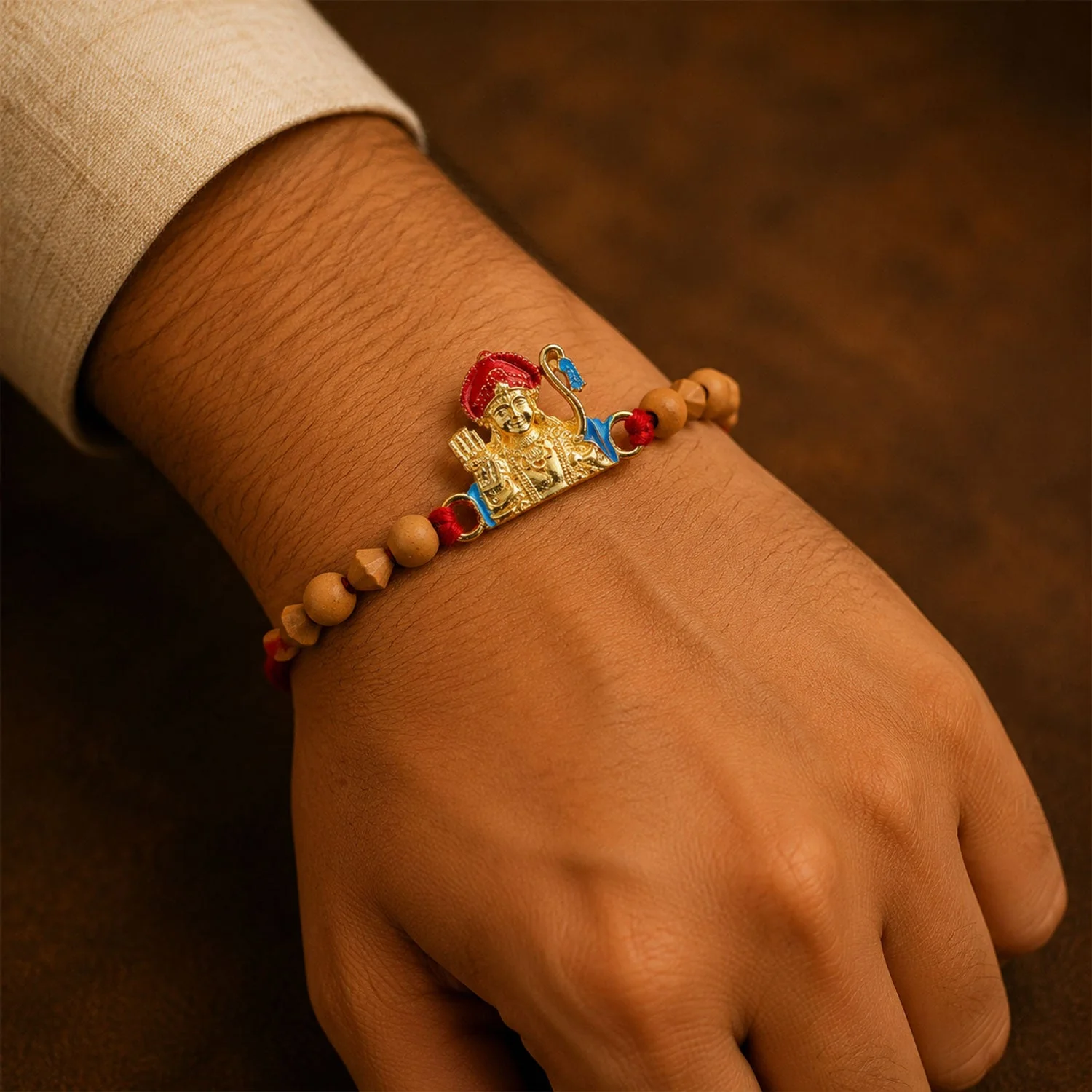 Rakhi for Brother – Golden Deity with sandalwood beads and modern charm - Image 2