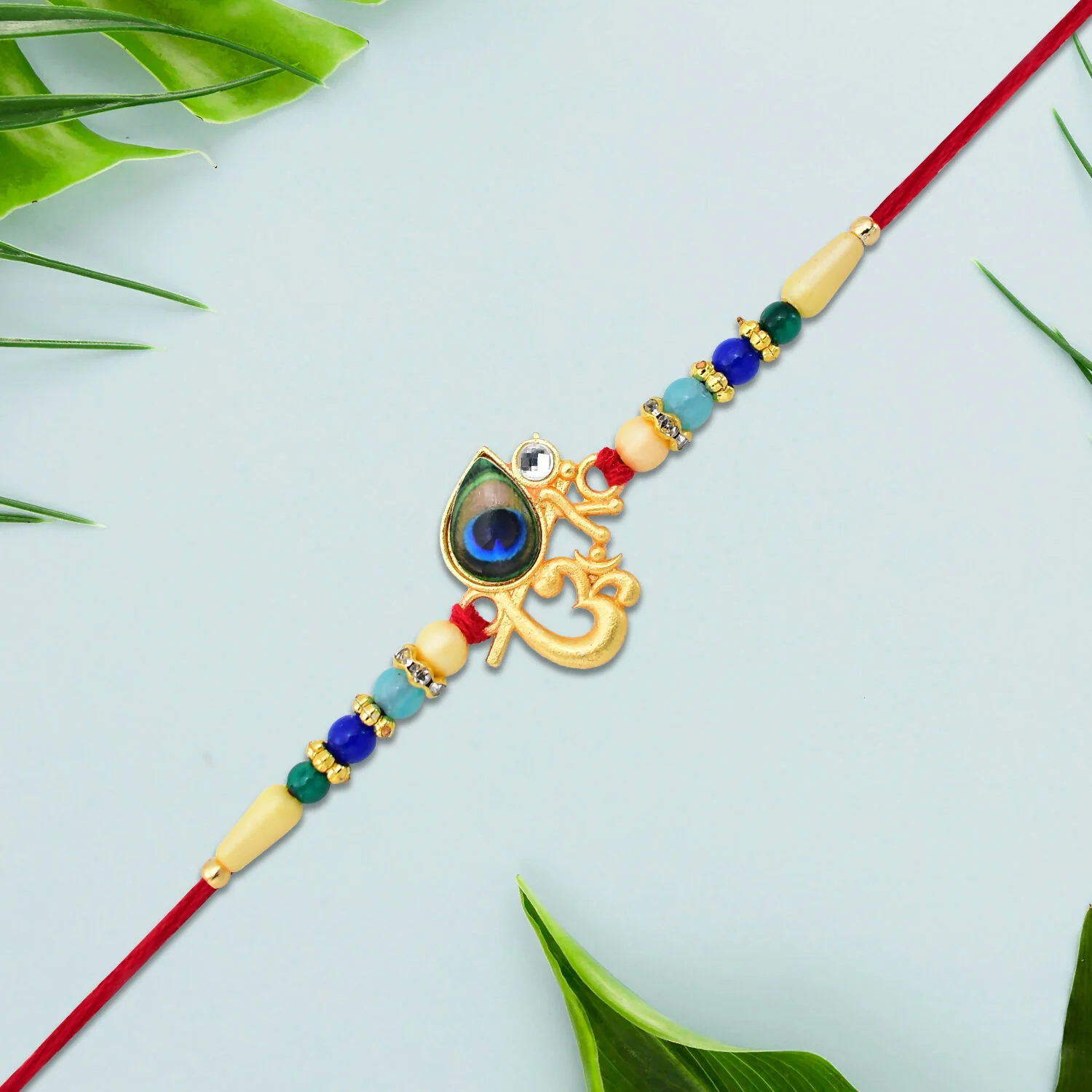 Peacock Feather Rakhi – Divine Multicolor Beads for Brother - Image 4