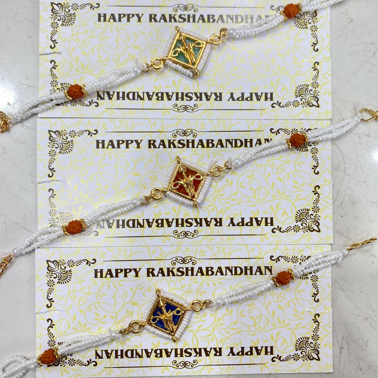 Kundan Meenakari Rakhi Set – Multicolor Rudraksha & Pearl - Image 4