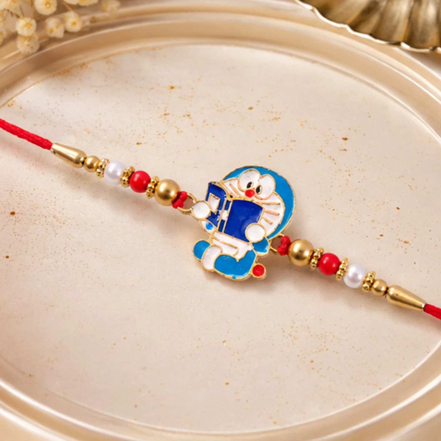 Doraemon Kids Rakhi – Cartoon Beads for Brother & Festive Joy - Image 4