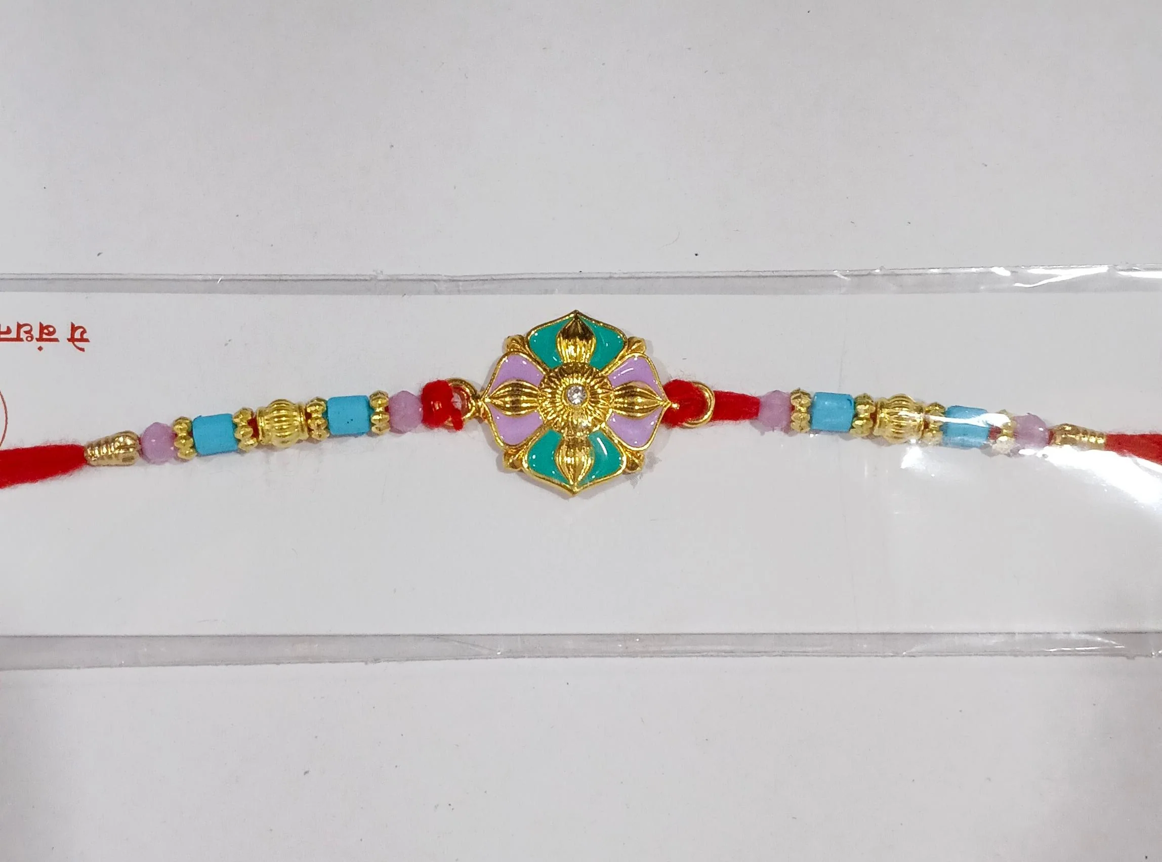 Rakshabandhan Flower Motif Rakhi – Colorful Beads & Soft Thread - Image 8