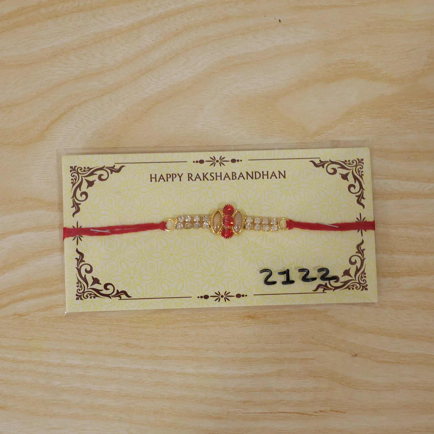 Rakhi – Elegant Gold & Pink Stone Designer Thread for Brothers - Image 7