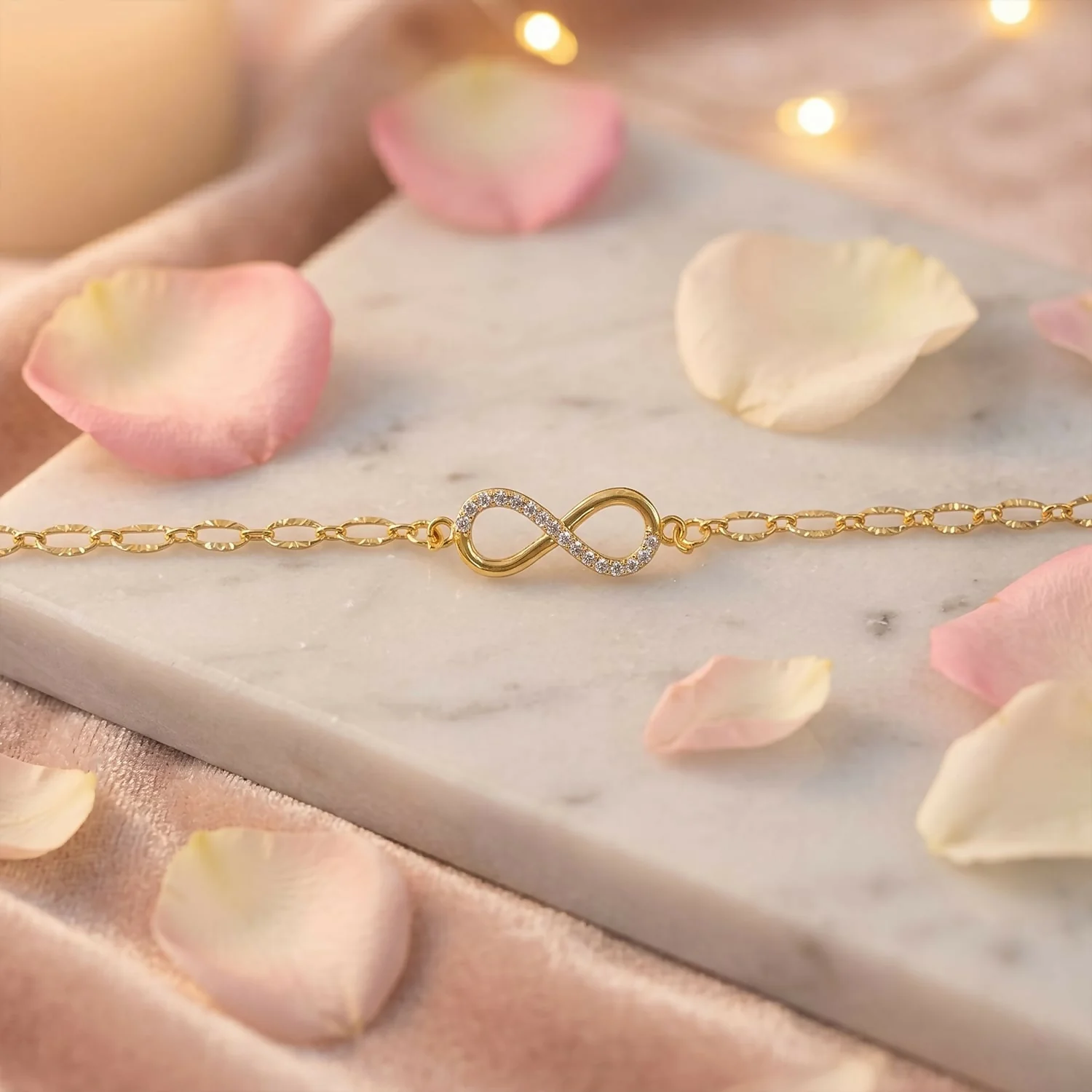 Gold Infinity Bracelet with Heart Charm – Elegant & Adjustable Fit