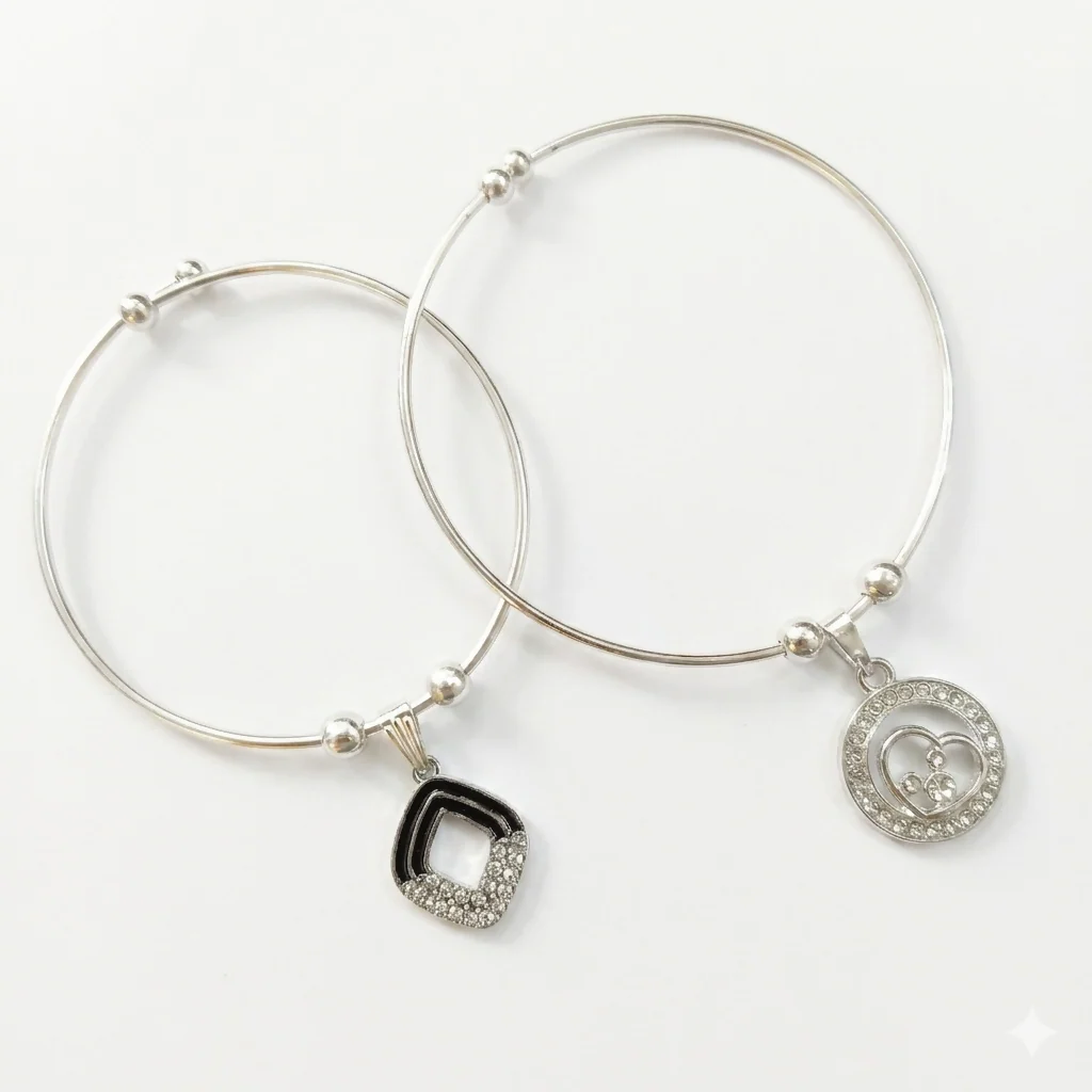 Elegant Silver Bangles with Crystal Square and Heart Charm Designs - Image 4