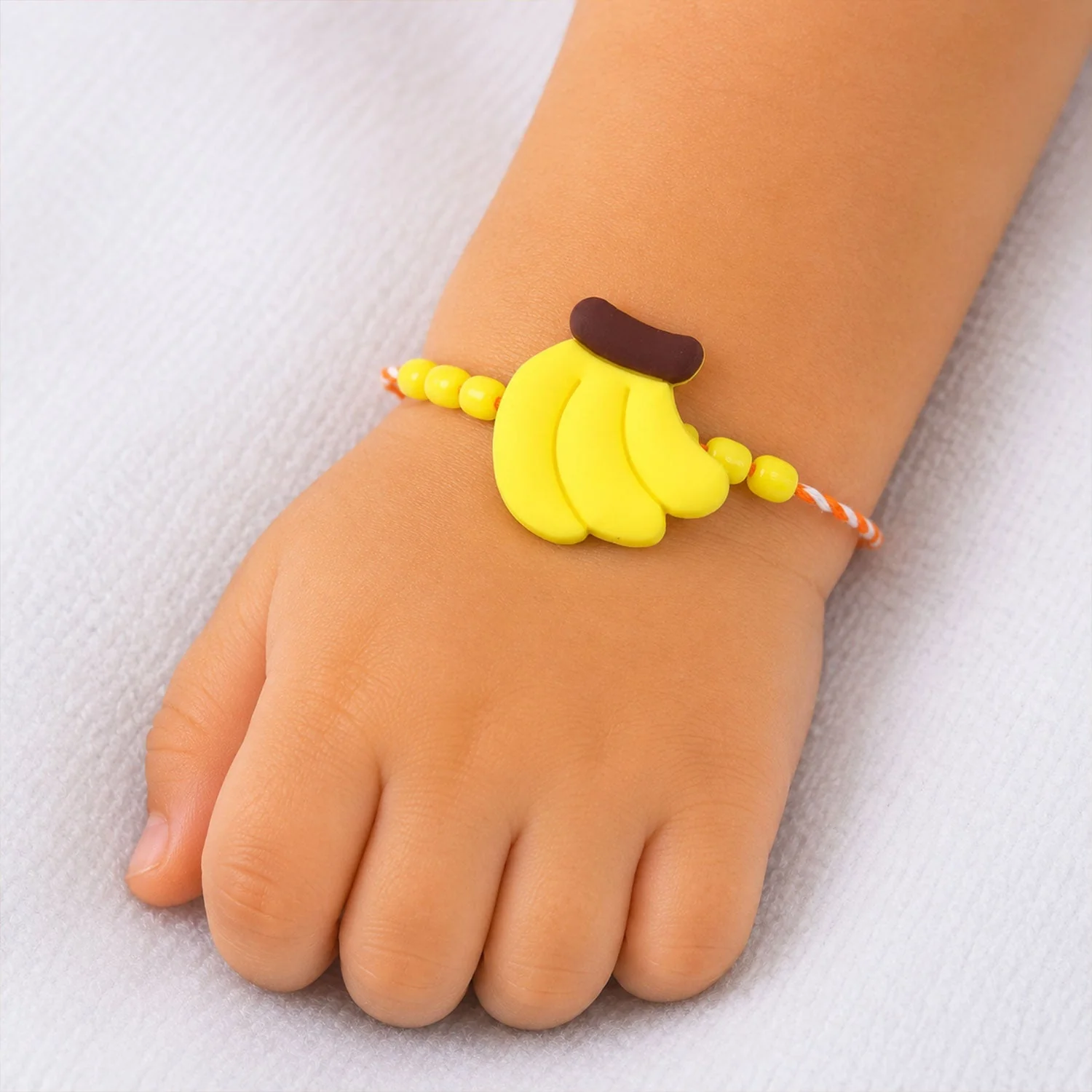 Yellow Banana Rakhi for Kids – Playful & Heartfelt Sibling Gift - Image 4