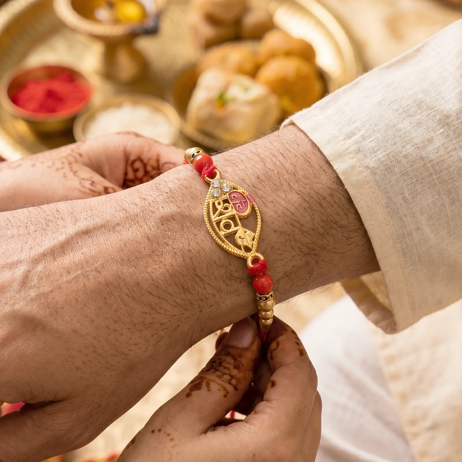 Rakhi – Elegant Gold Leaf Shiv Design with Pearls & Beads - Image 4