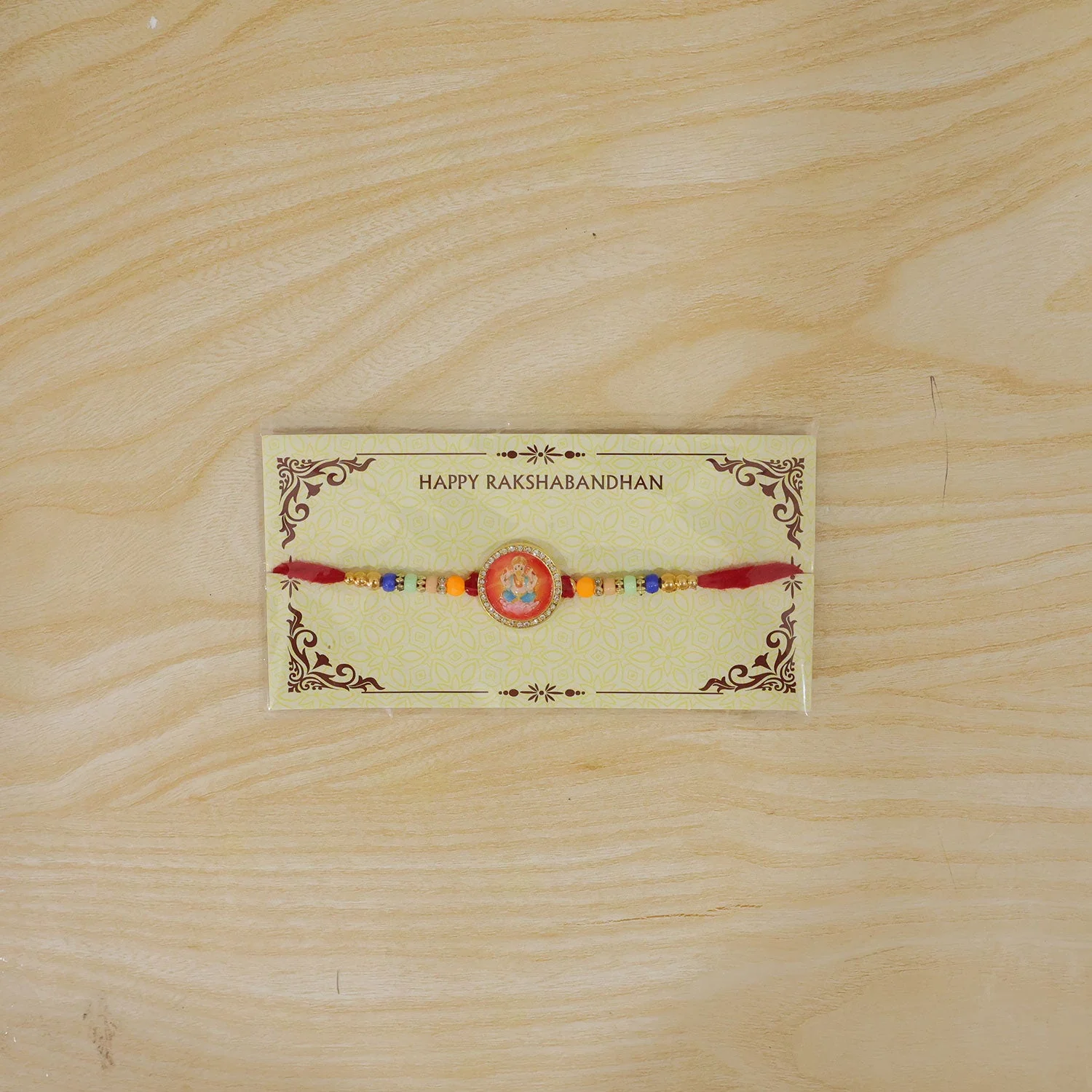 Golden Ganesha Motif Rakhi with Stones & Colorful Beads Rakhi for Brother - Image 6
