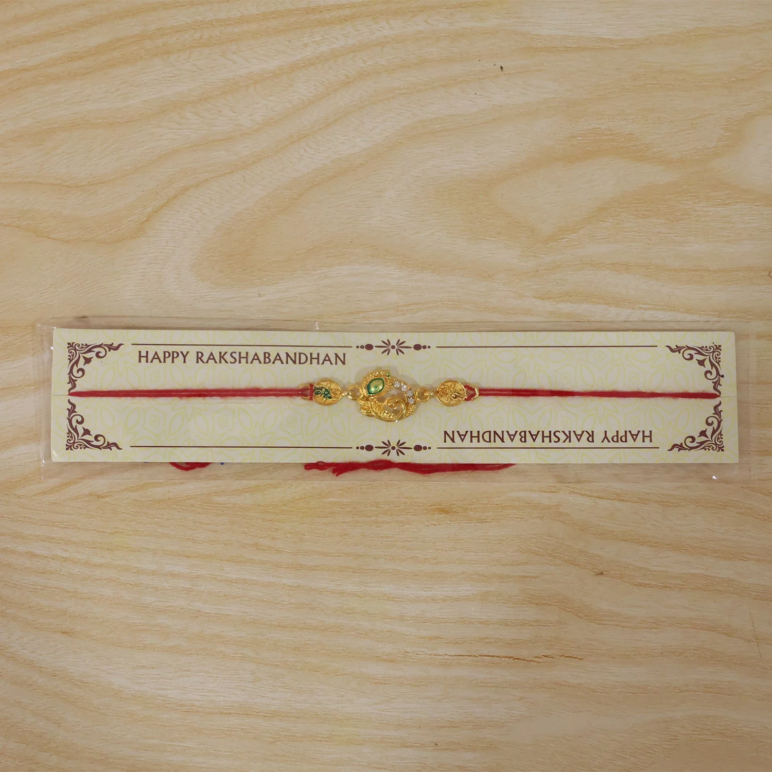 Meenakari Rakhi – Golden Peacock Design with AD Stones - Image 6