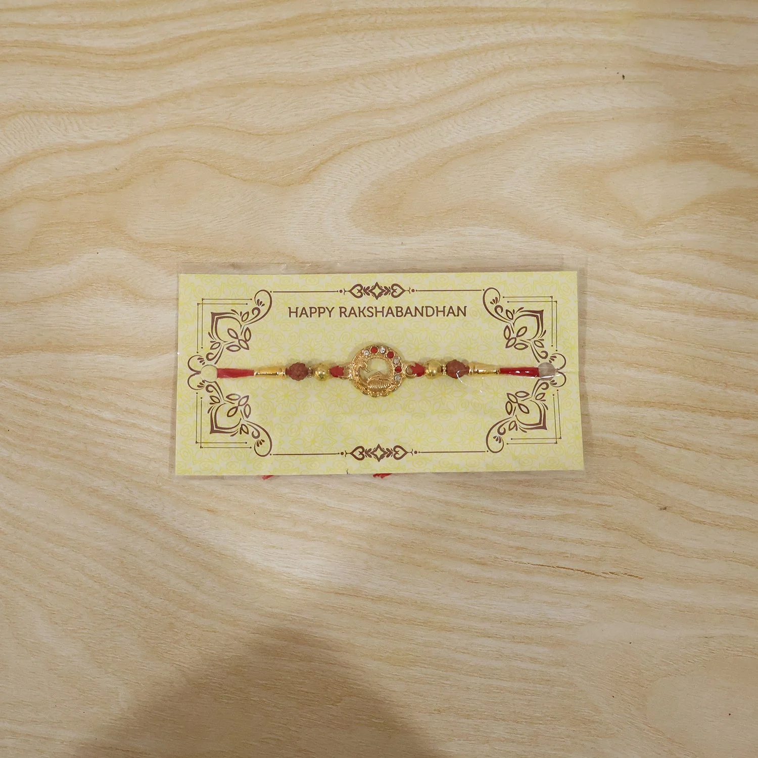 Golden Peacock Rakhi – Elegant Design with Rudraksha Beads for Brothers - Image 8