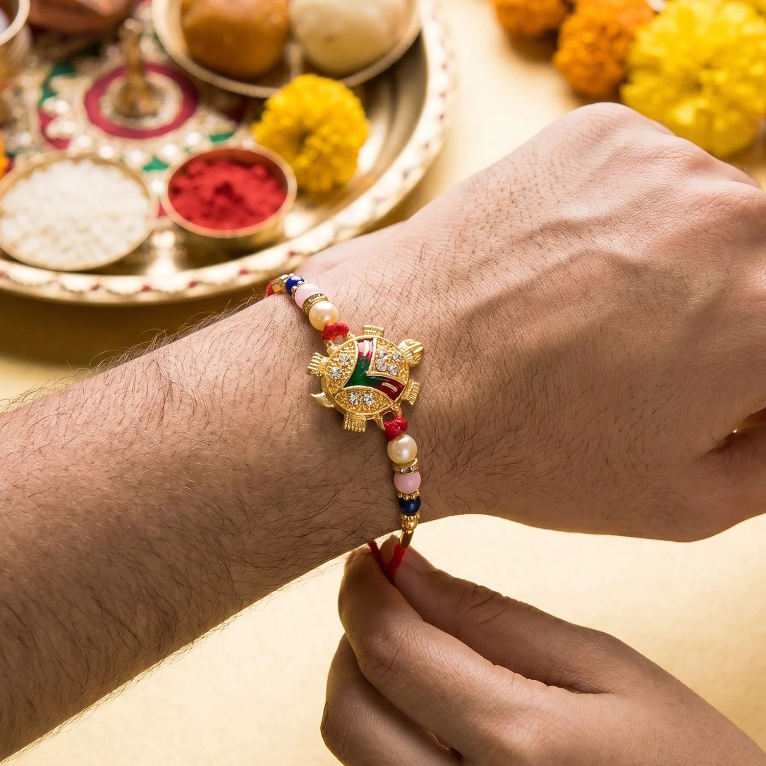 Golden Turtle Rakhi – Elegant Pearl Beads & Soft Thread for Raksha Bandhan - Image 4