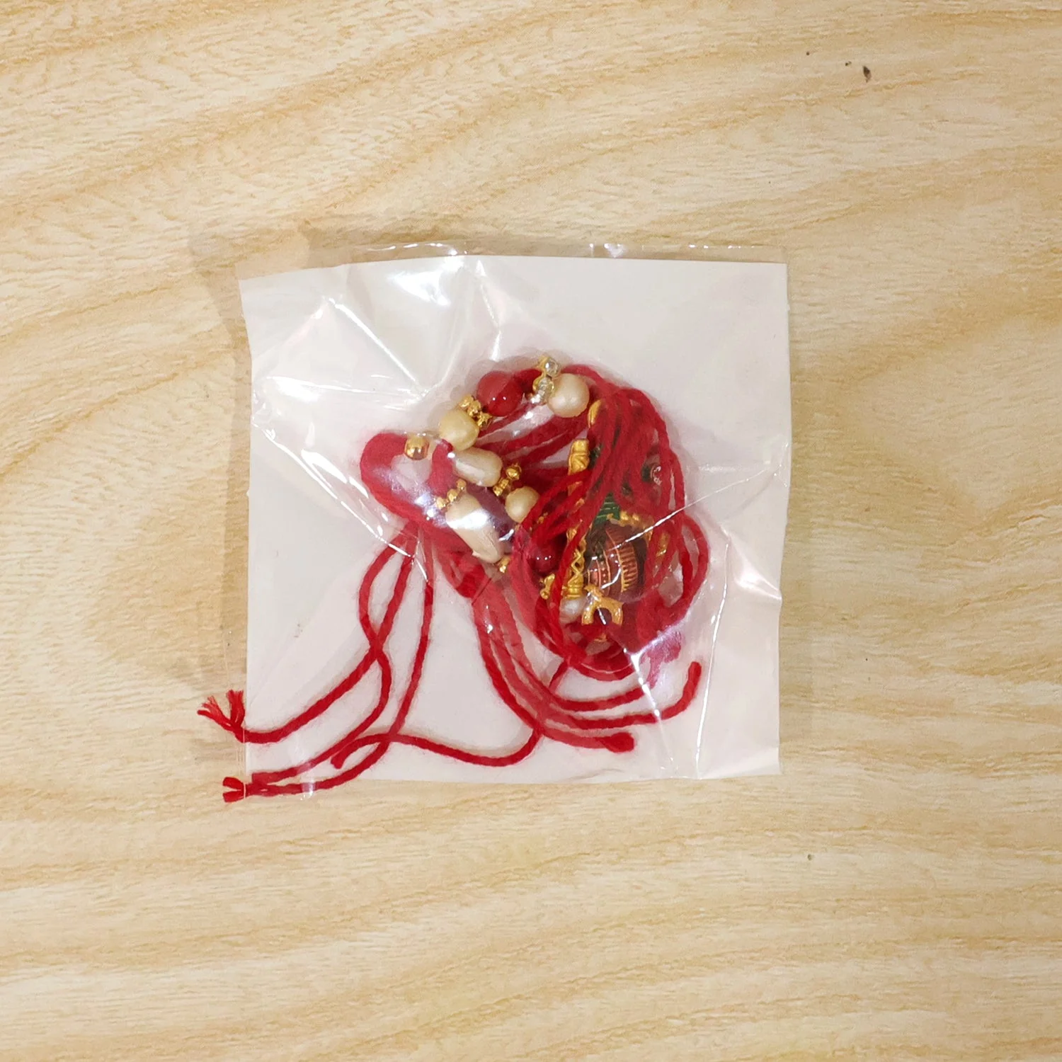 Rakhi for Brother – Beautiful festive thread with peacock feather - Image 5