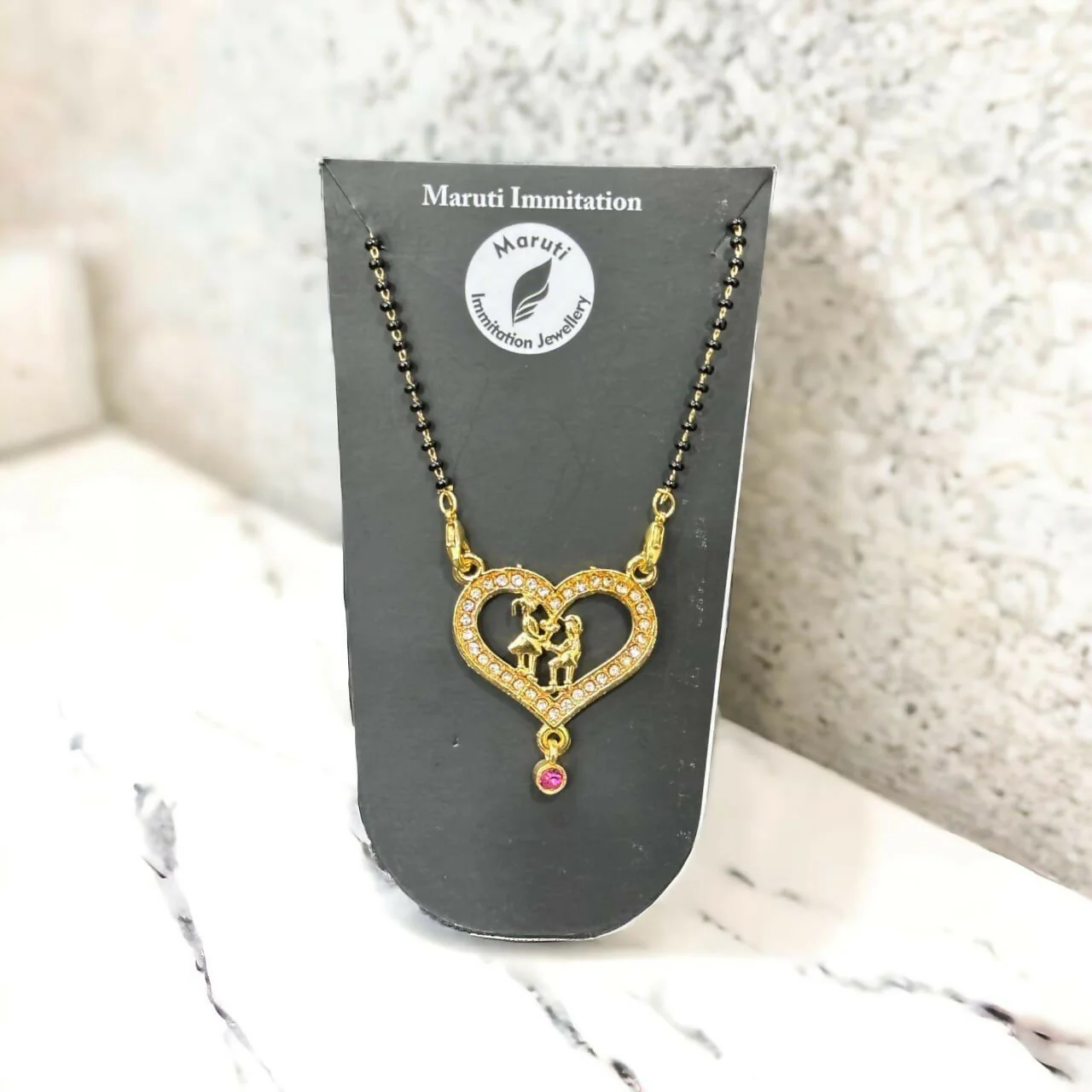 Heart Mangalsutra – Elegant Gold-Tone Couple Pendant with Stones - Image 2