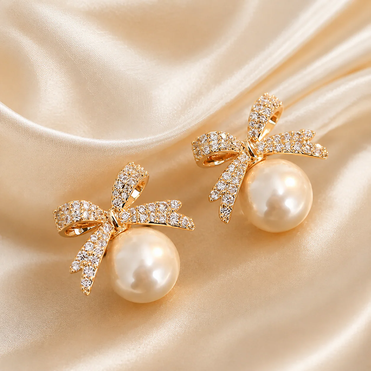 Pearl Bow Stud Earrings – Gold Plated & Elegant for Women