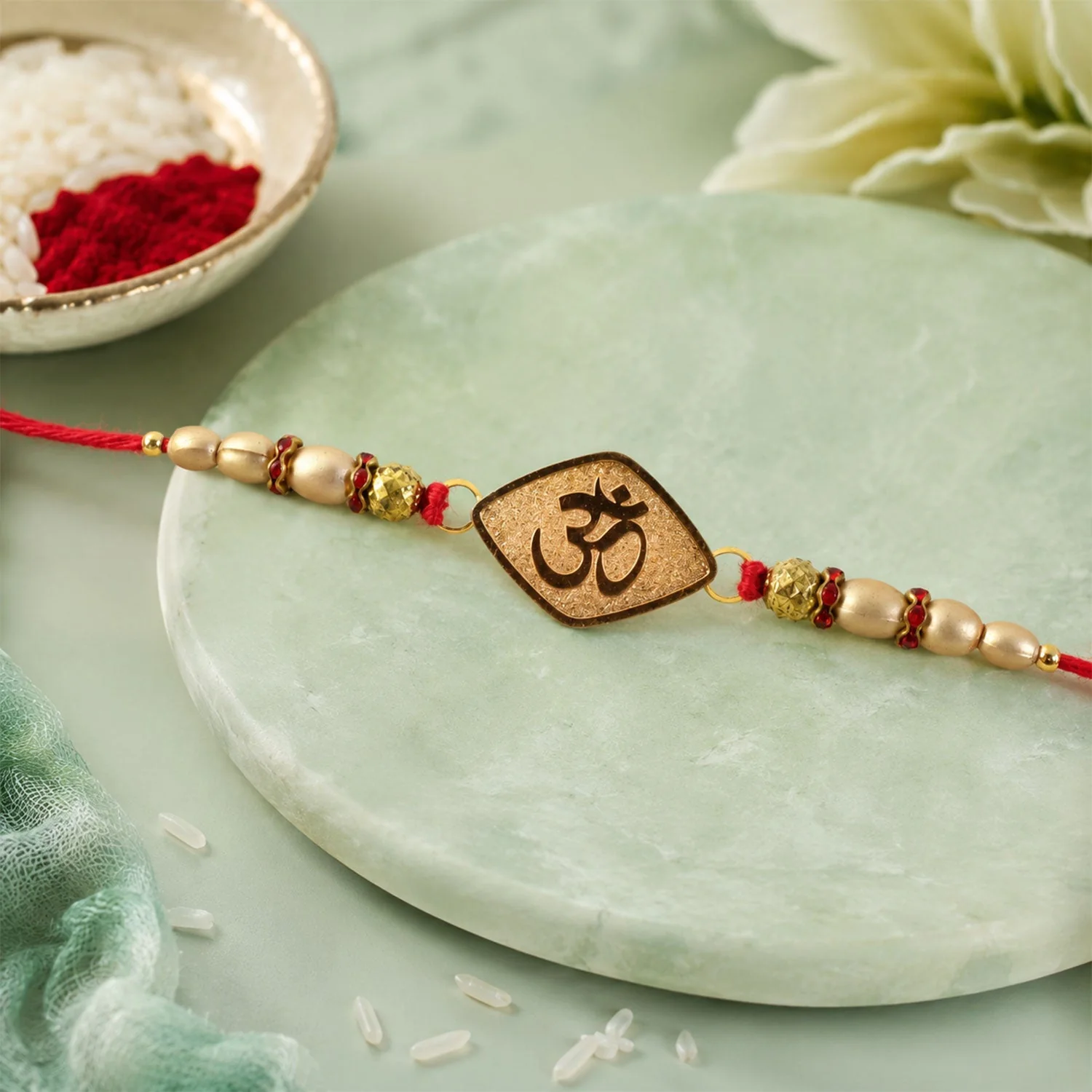Om Symbol Shape Beaded Designer Rakhi for Brother - Image 4