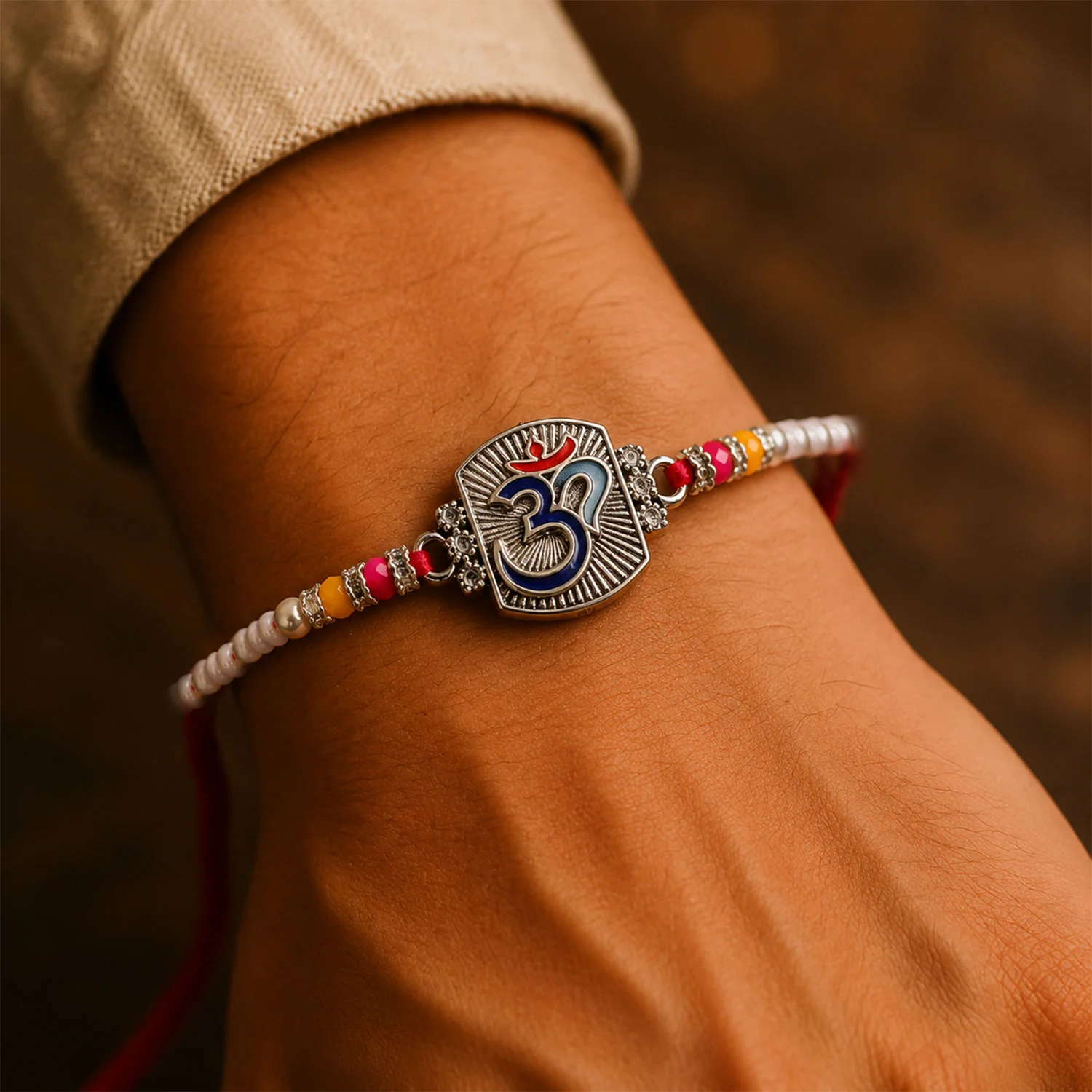 Om Symbol Silver Centre Rakhi with White Beads, Roli Chawal Coin and Peacock Gift Packing - Image 4