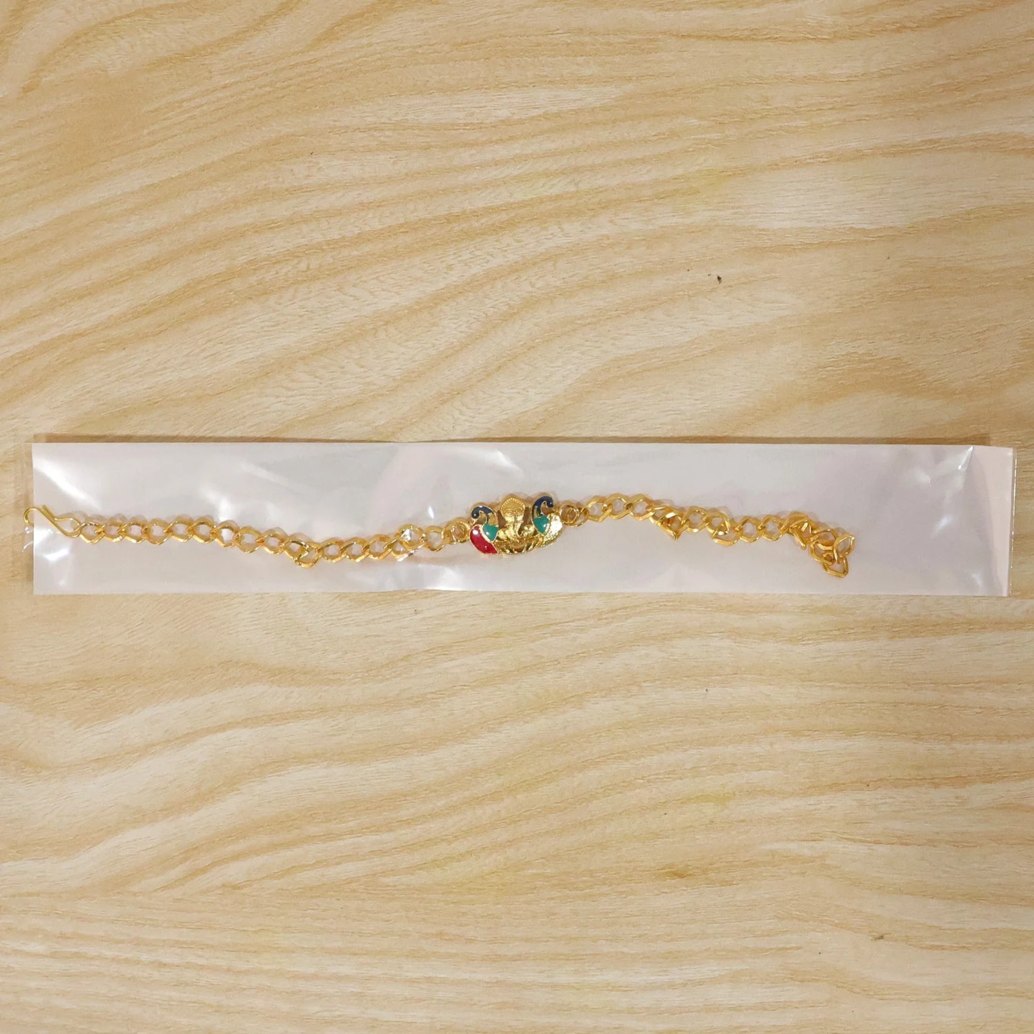 Peacock Ganesh Charm Rakhi – Stylish Festive Brother's Thread - Image 6