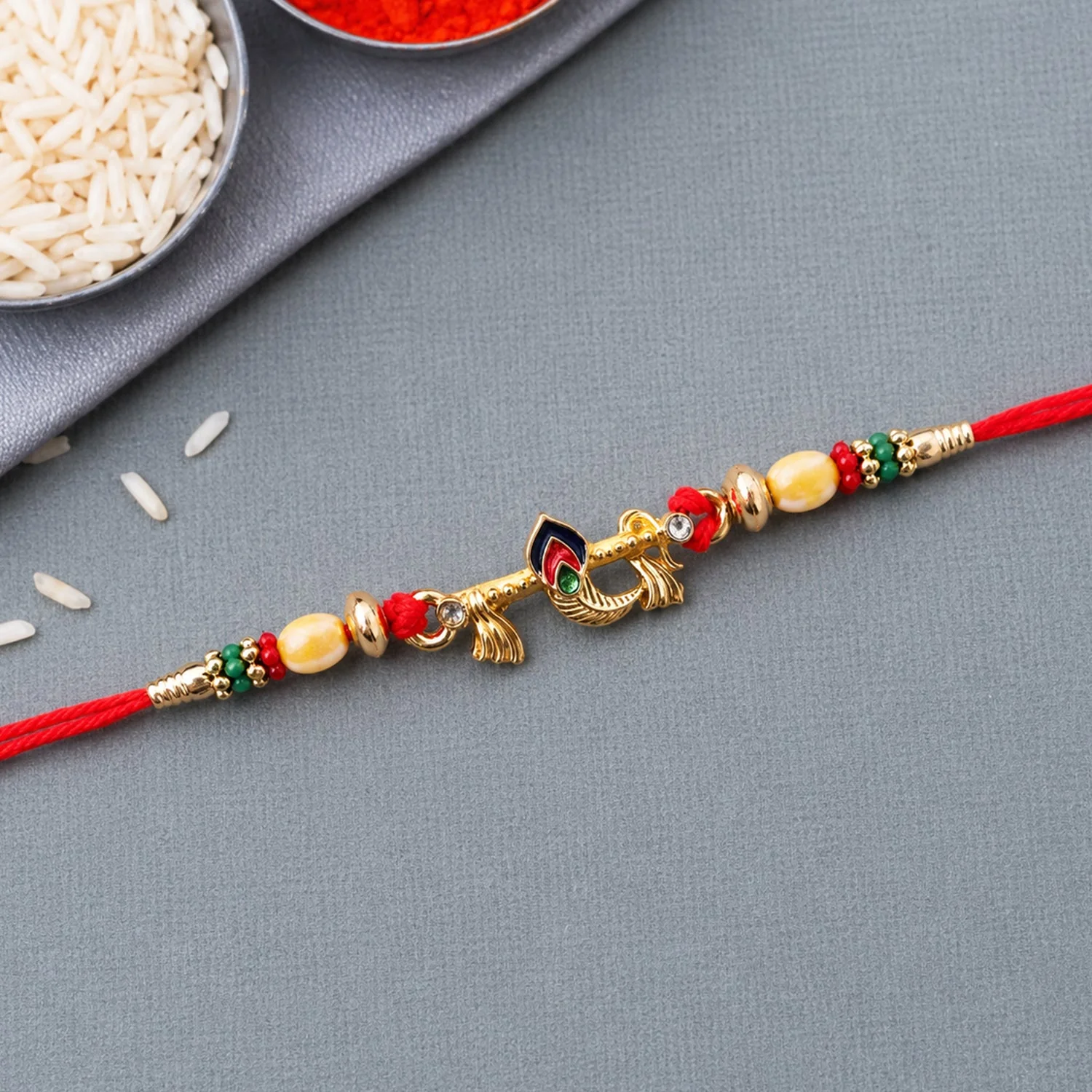 Peacock Feather Rakhi – Elegant Traditional Brother Gift - Image 2