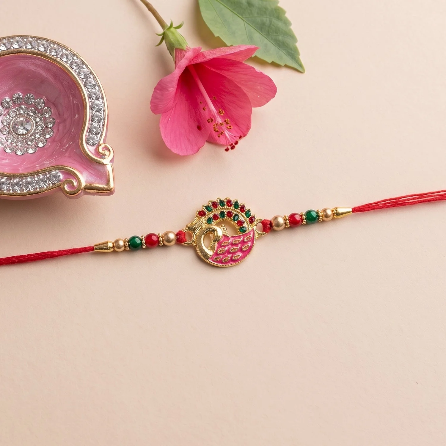 Rakshabandhan Pink Peacock Rakhi – Decorative Beads & Soft Thread - Image 2