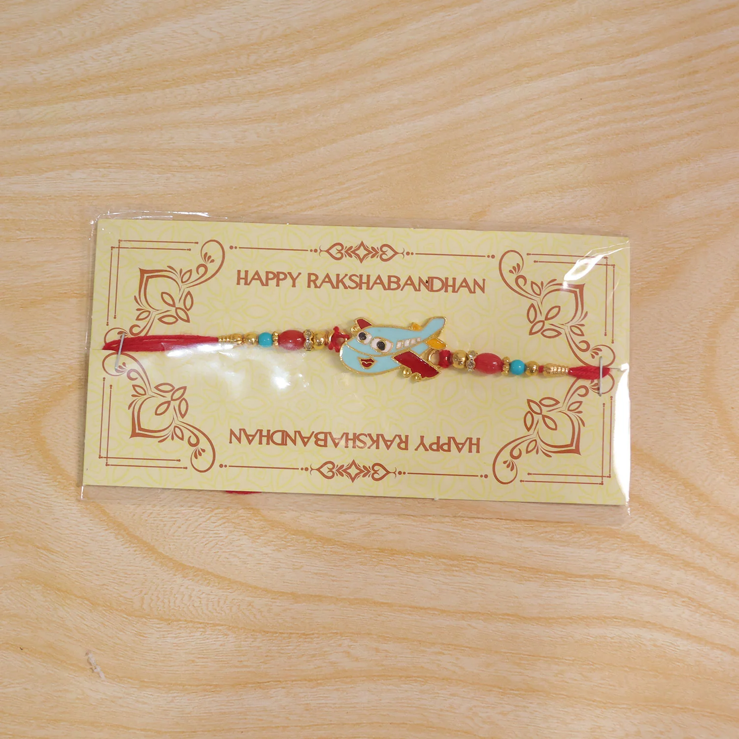 Kids Rakhi – Playful Airplane Design Multicolor Beads - Image 6