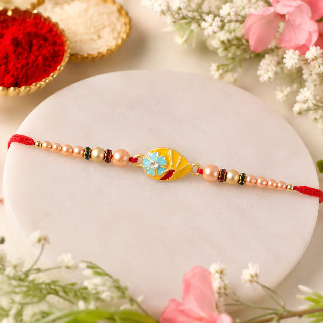 Premium Traditional Meenakari Oval Rakhi with Pearls – Rakhi for Brother - Image 4