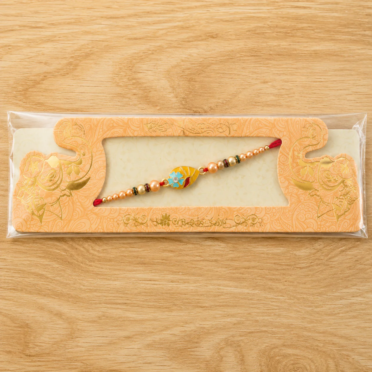 Premium Traditional Meenakari Oval Rakhi with Pearls – Rakhi for Brother - Image 6