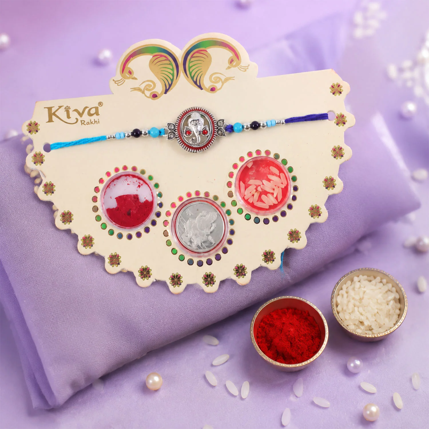 Round Ganesha Medallion Rakhi with Blue Thread, Roli Chawal Coin and Peacock Card Packing - Image 3