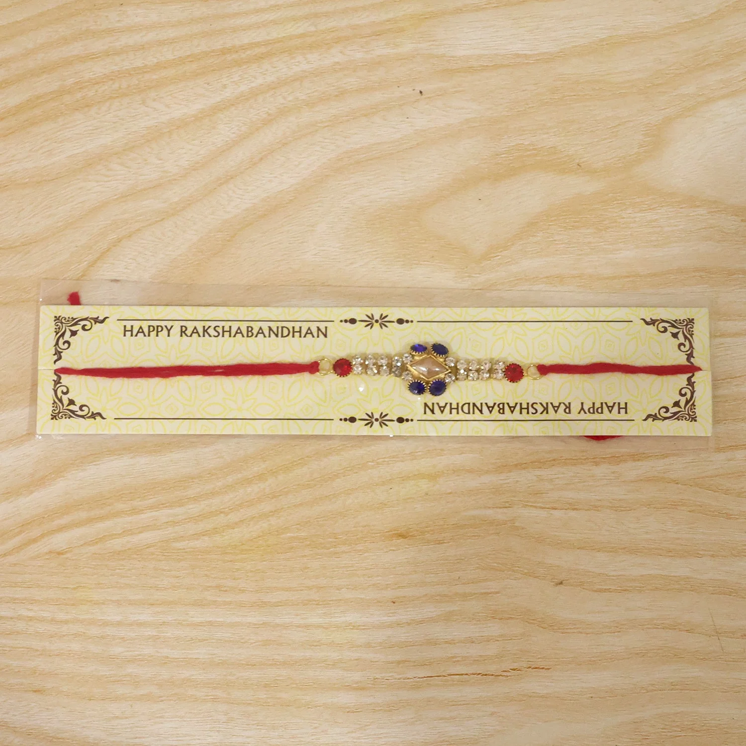 AD Stone Rakhi – Elegant Royal Blue & White Design for Brother - Image 6