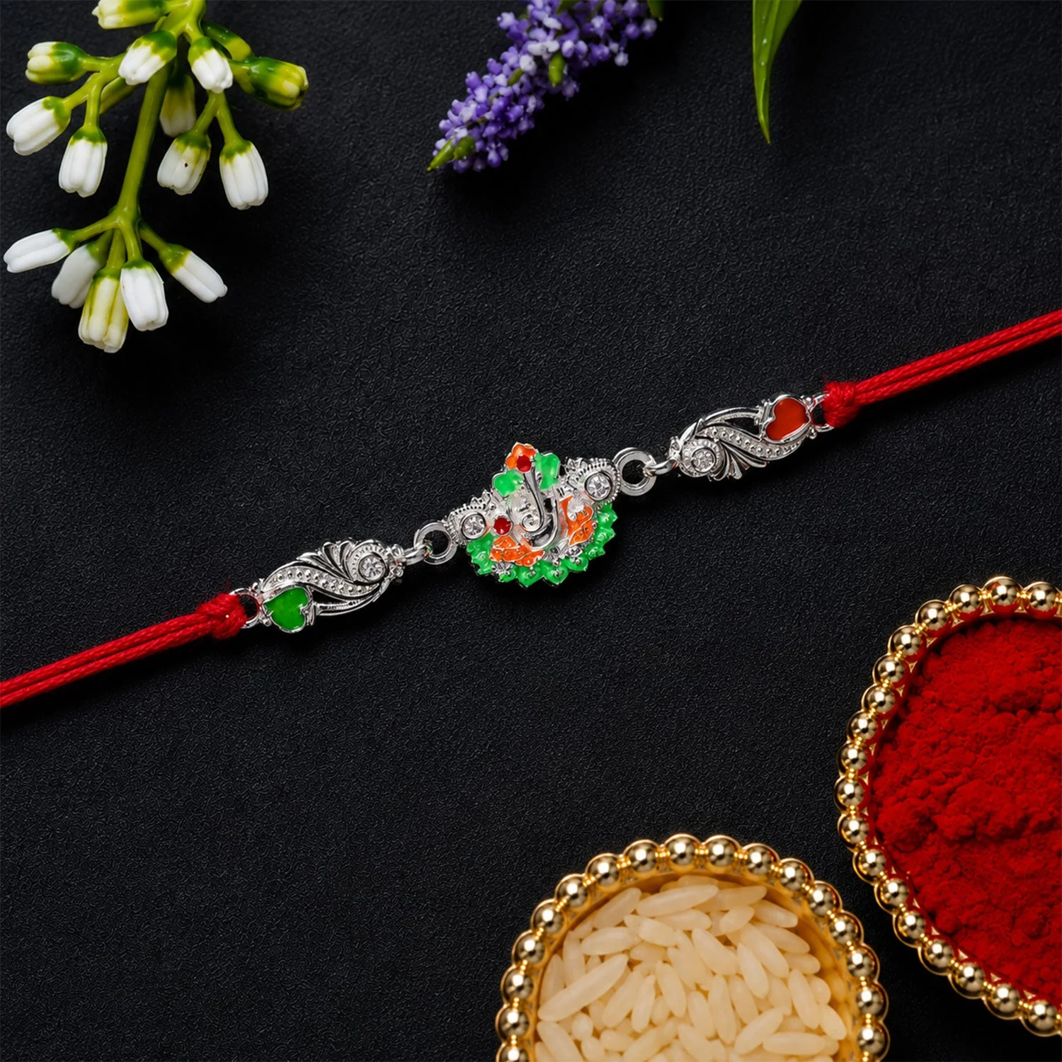 Rakhi – Elegant Silver Ganesh Charm with Red Dori for Brother - Image 4
