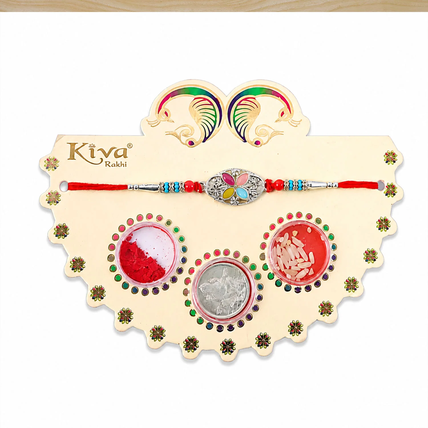 Silver Oval Floral Stone Rakhi with Color Petal Centre, Roli Chawal Coin and Card Packing - Image 4