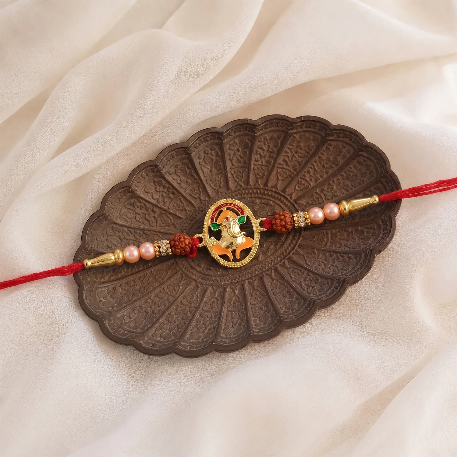 Traditional Ganesha Rakhi – Elegant spiritual festival accessory - Image 2