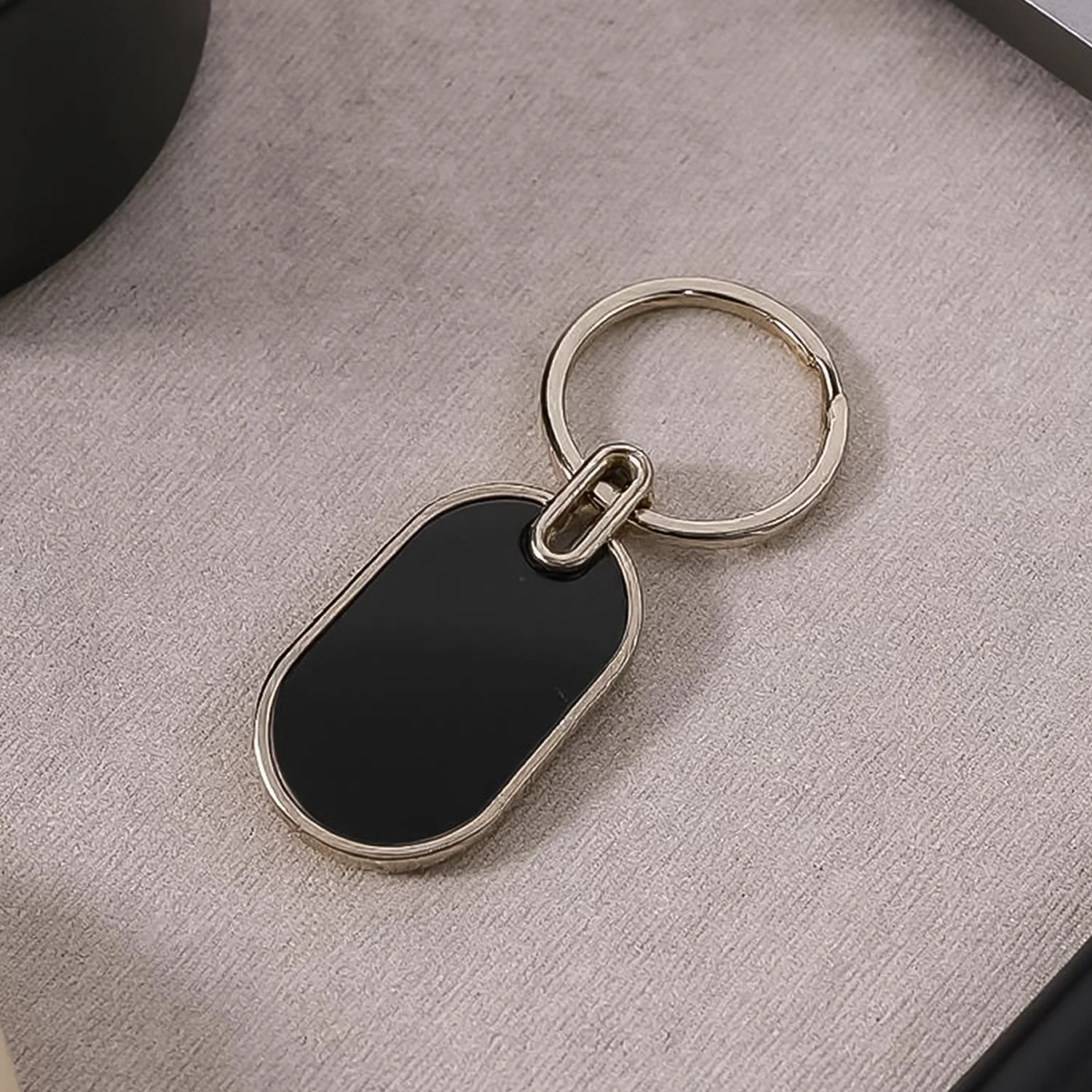 Oval Metal Keychain – Elegant Black & Silver Finish for Stylish Key Organization